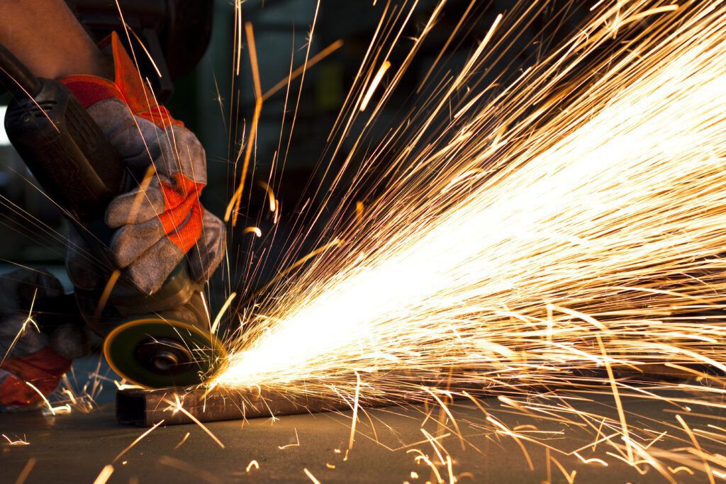 sparks while grinding in a steel factory
